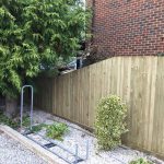 Traditional Featherboard Timber Fencing with decline at end