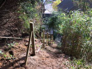 Stake fencing install on steep hill