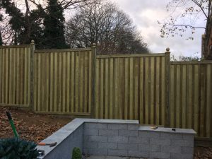 Fence panels installed on hill